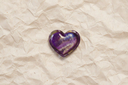 Purple heart-shaped brooch